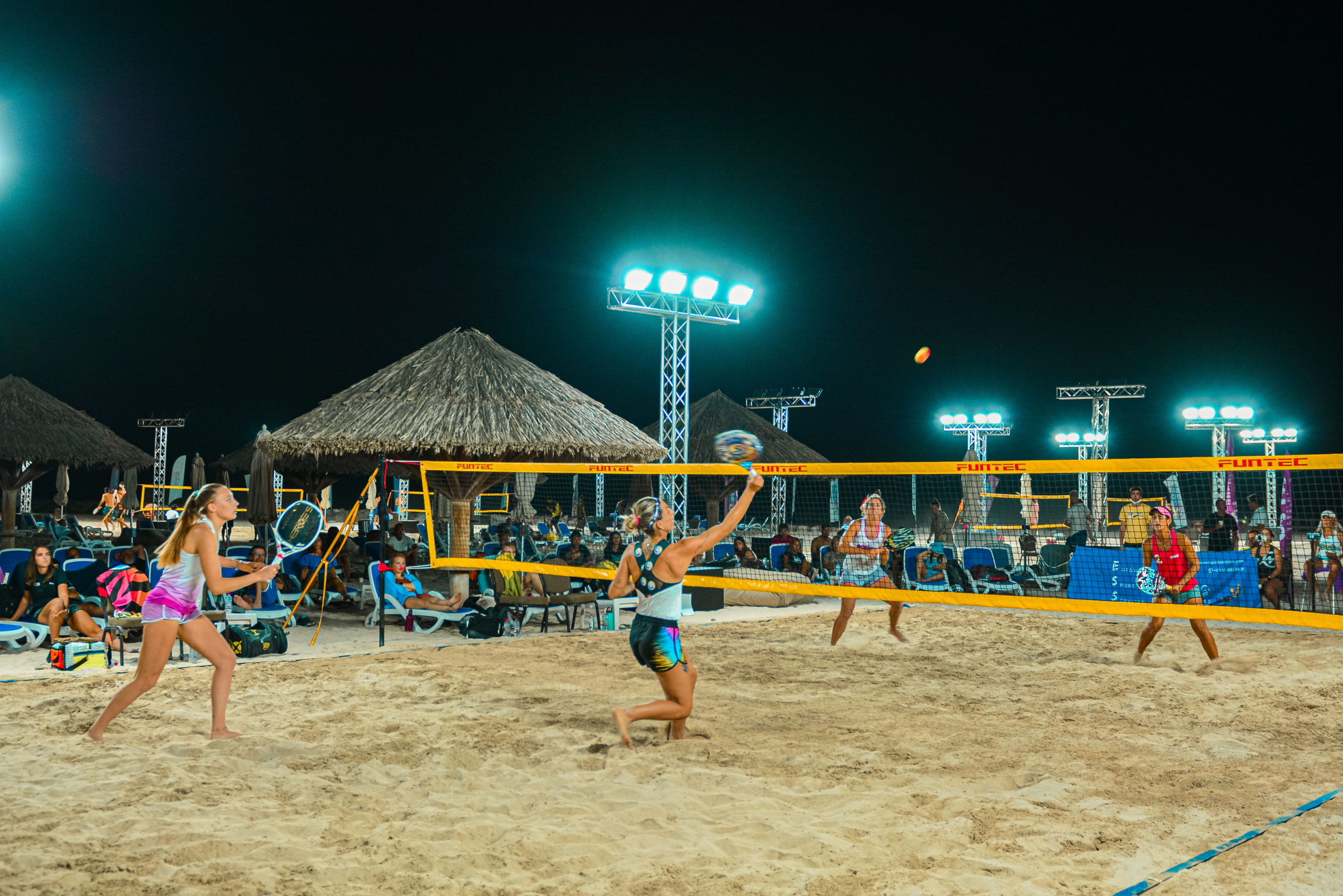 beach tennis in the night